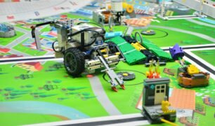 remote control toy car on green car track
